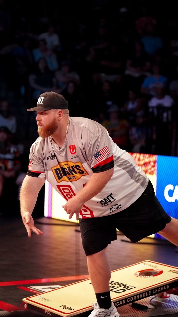 Jamie Graham mid-throw, wearing ACL Pro jersey with Bush's Best and ZüCa branding